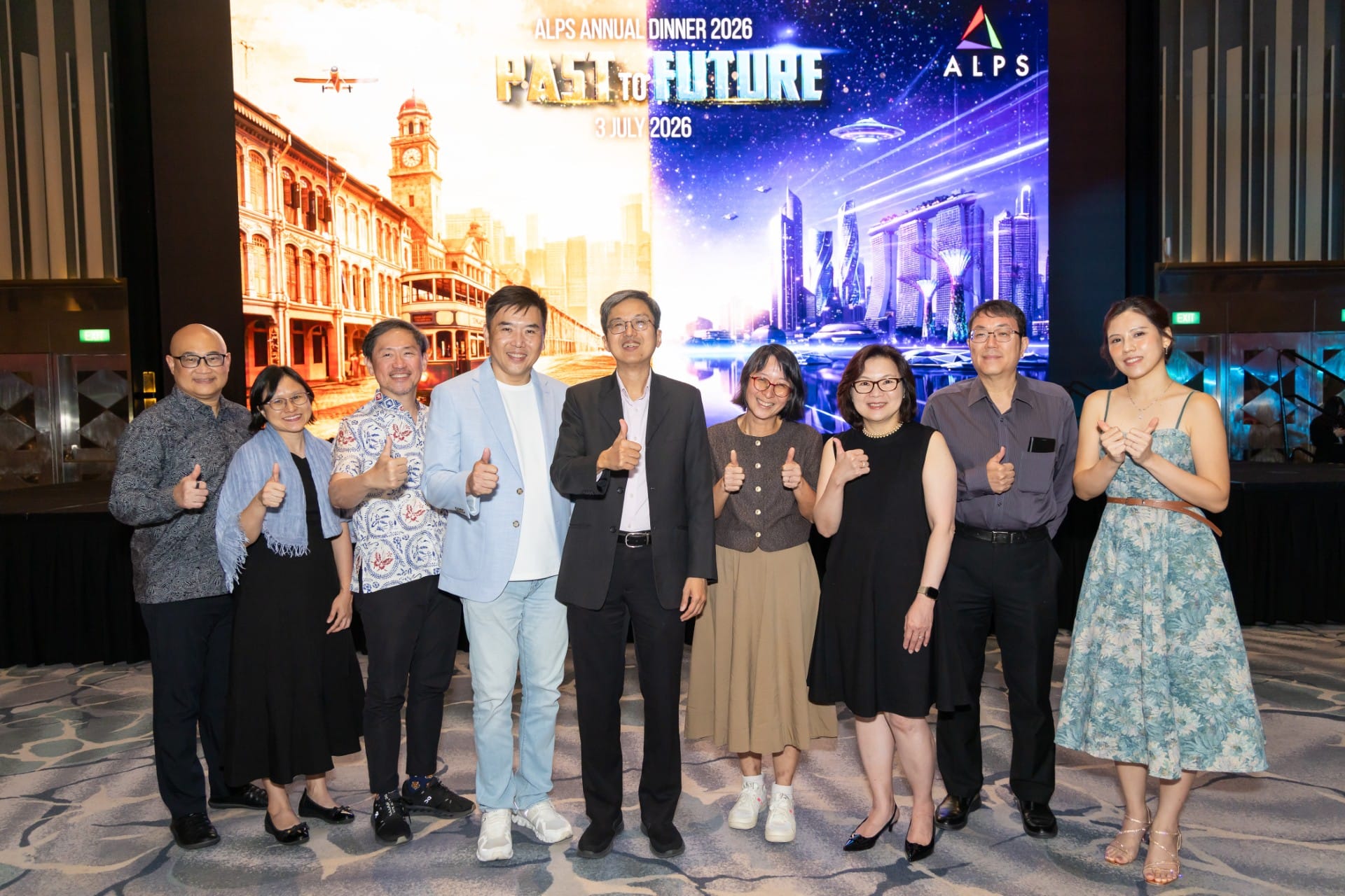 Photo of 9 ALPS staff taken at ALPS Anniversary Dinner